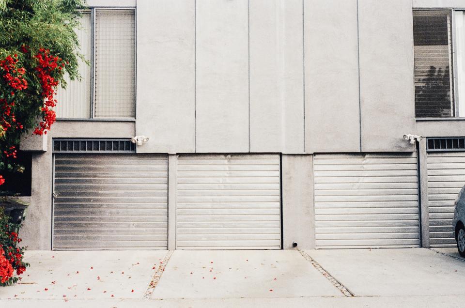 Concrete driveway leading to a garage